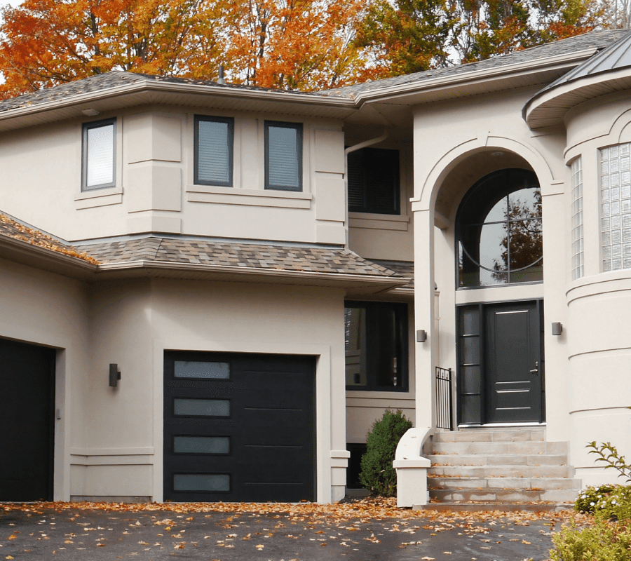 Modern residential house exterior with large picture windows and general glazing